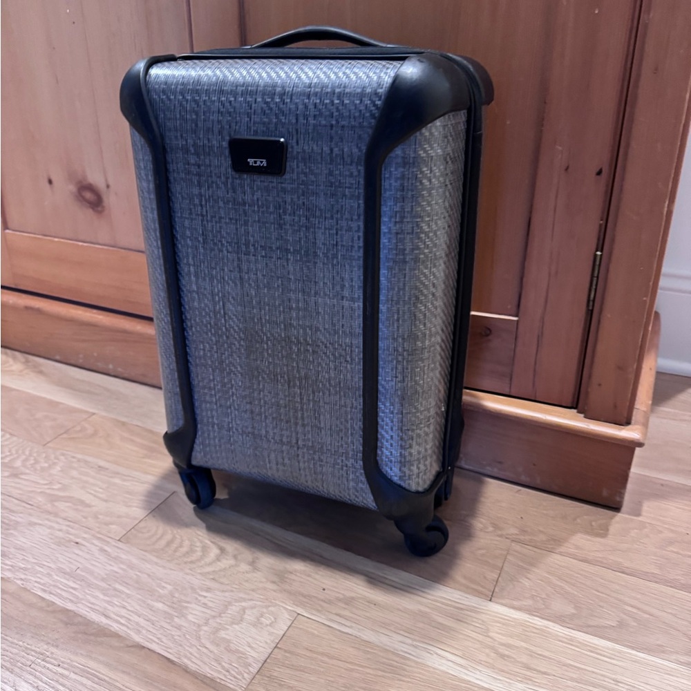 Tumi Gray and Black Durable Travel Luggage